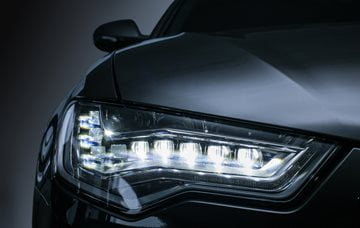 Close up LED headlight black and white